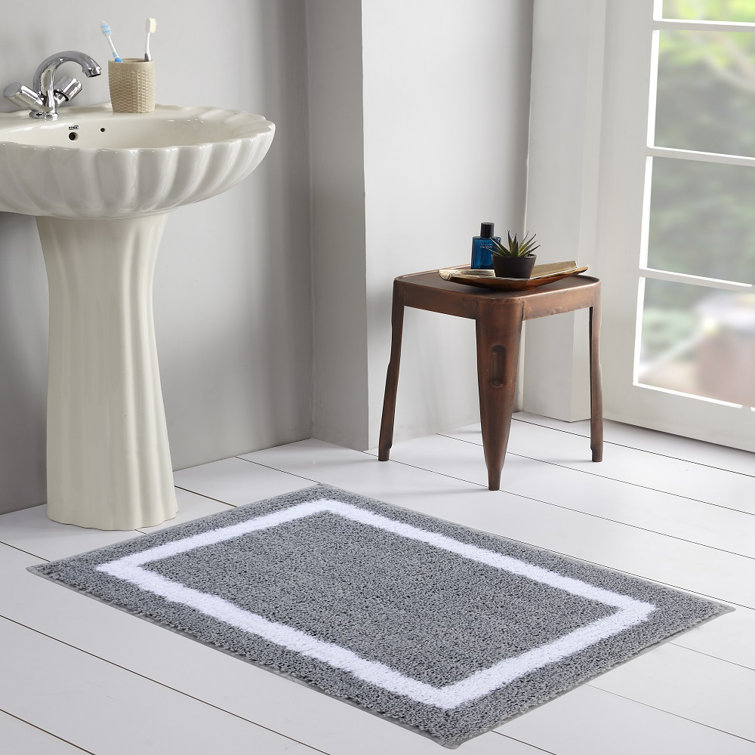 Reversible bath clearance mat